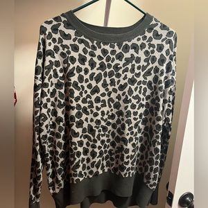 Cheetah print fitted sweater. Worn a few times still in great shape!